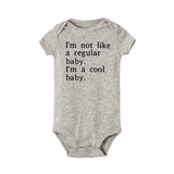I'm Not Like a Regular Baby. I'm a Cool Baby. - Unisex Baby Onesie Bodysuit (White & Black)